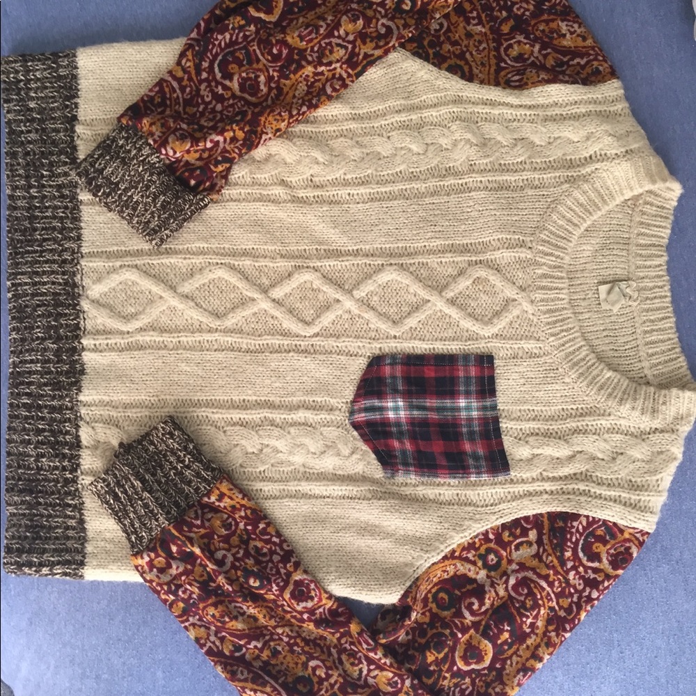 Buckle knit sweater